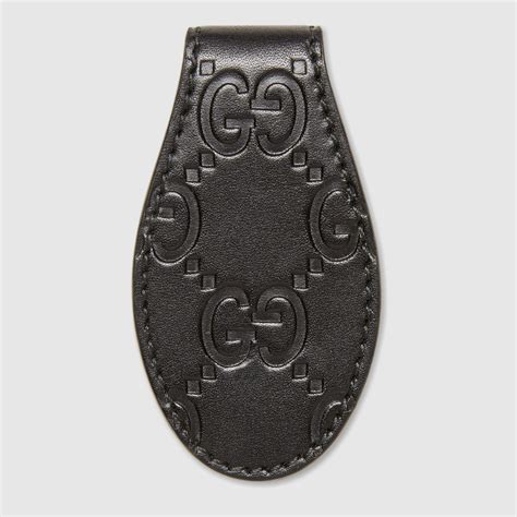 gucci dummy clip|Gucci black leather clip.